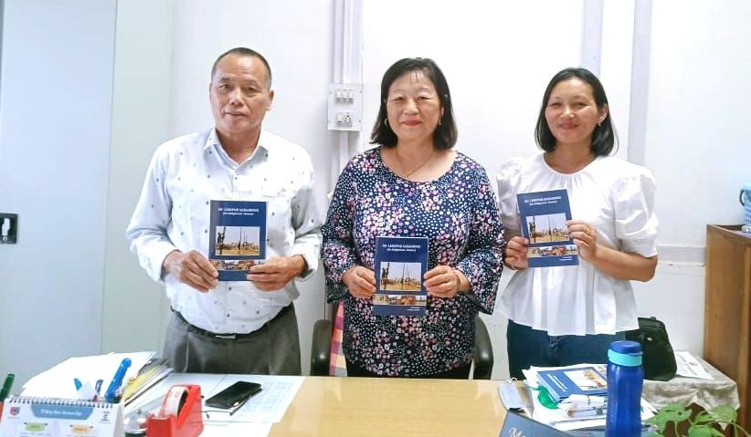 Fazl Ali College Vice-Principal R Arenla Aier during the release of ‘Ao Lisopur Saisabong’ book with the authors I Temjen Tzüdir and Toshisangla on 6 September. (Morung Photo)